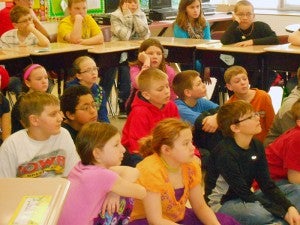 Fourth- and fifth-graders at Alden-Conger school learn about electricity and safety during a demonstration from Freeborn-Mower Cooperative Services on March 1.