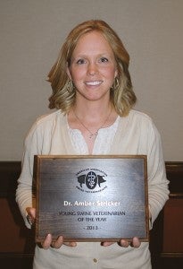 Albert Lea woman Amber Stricker earlier this month received the Young Swine Veterinarian of the Year Award through the American Association of Swine Veterinarians.  --Submitted