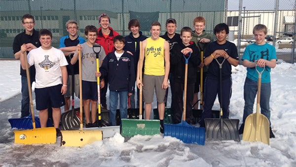The Albert Lea boys’ tennis team used the above-freezing temperatures to scoop the slush and snow off the courts. The Tigers have been practicing in the gym at Hawthorne Elementary School due to the snow. Albert Lea’s first match against Stewartville has been postponed to April 12, while the season opener will be at home against New Prague at 4:30 p.m. on Thursday. — Submitted