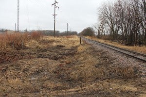 Dakota, Minnesota & Eastern Railroad tracks decline in elevation as they approach Albert Lea Lake from the east. The trail is slated to be on the south side of the track, which is on the left side of this photo.