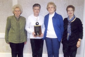 The bowling team sponsored by Bauer Built won the championship in the Shopper’s Special bowling league for the 2012-13 season at Holiday Lanes. From the left are Ella Nelson, Virginia Stenseth, Jackie Anderson and Cathy Carter. — Submitted