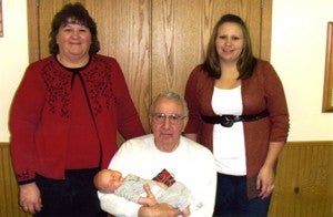 From left are grandma Connie Bergerson, baby Jaxton David, great-grandpa Roger Schultz and mother Ashley David.