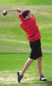 Alex Claassen of the Albert Lea boys’ golf team tees off Tuesday at Wedgewood Cove Golf Club. The Tigers were only able to complete 14 of the 18 holes because of the threat of thunderstorms. During the action that was completed, Faribault edged Albert Lea by two strokes: 242-244. Brent Nafzger led the Tigers with 56 strokes, while Lucas Peterson scored 62. — Micah Bader/Albert Lea Tribune