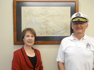 Farmer’s State Bank has become a community partner with the Pelican Breeze Foundation. Paul Stieler, president of the Pelican Breeze Foundation accepted $5,000 from bank President Nancy Skophammer, left, for the Float the Boat fundraising campaign. The campaign was started to pay for the Pelican Breeze II cruise boat. --Submitted