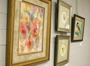 Some of the artwork in the Albert Lea Art Center's new show hangs on the walls Friday. -- Sarah Stultz/Albert Lea Tribune    