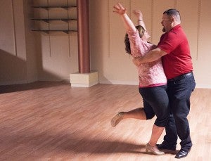 Amy Gauthier and Jeff Strom rehearse their waltz number Wednesday at Northbridge Mall. Strom is a lieutenant with the Albert Lea Police Department. Gauthier is an administrative assistant with the Albert Lea-Freeborn County Chamber of Commerce. – Colleen Harrison/Albert Lea Tribune