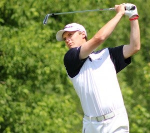 Lucas Peterson tees off at The Ridges at Sand Creek during the Class AA state tournament. — Jacob Tellers/Albert Lea Tribune