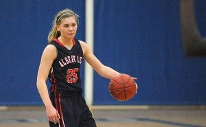 Sydney Rehnelt of Albert Lea handles the ball on Jan. 24 against Austin at Albert Lea. Rehnelt passed the 1,000-career point barrier on March 5 against Waseca in the Section 1AAA quarterfinals. – Micah Bader/Albert Lea Tribune