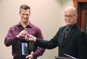 Albert Lea-Freeborn County Chamber of Commerce Executive Director Randy Kehr hands Erbert & Gerbert’s owner Kurt Wallace the microphone to speak after being named as Medium Business of the Year. - Sarah Stultz/Albert Lea Tribune