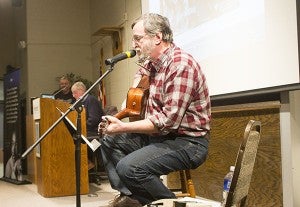 Keynote speaker Tom Muschler performs Thursday night at Riverland Community College. - Sam Wilmes/Albert Lea Tribune