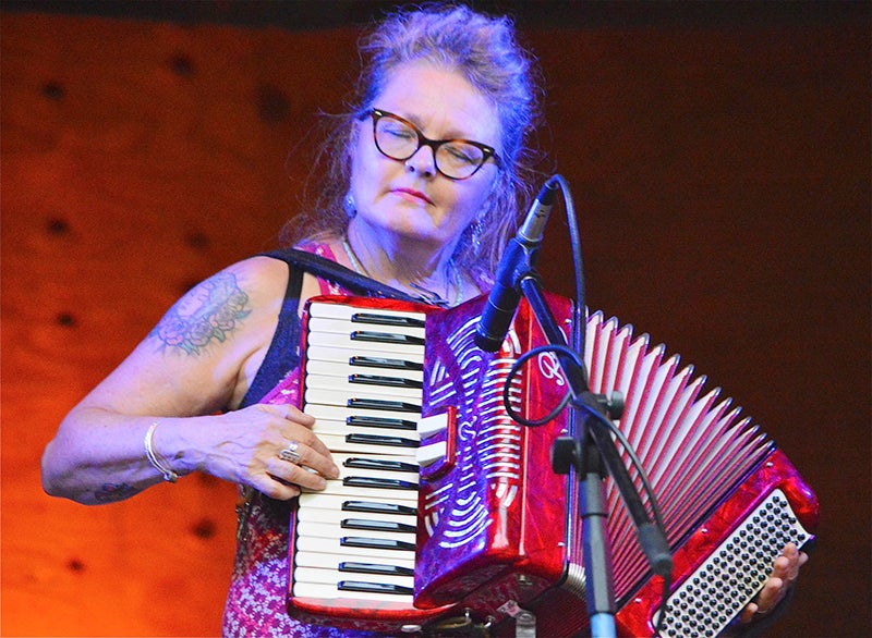 Julie King of Bernie King and the Guilty Pleasures plays accordion and percussion. - Provided